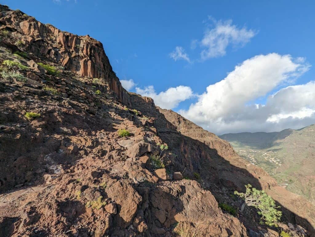 Steep rocky slope with a view into the valley