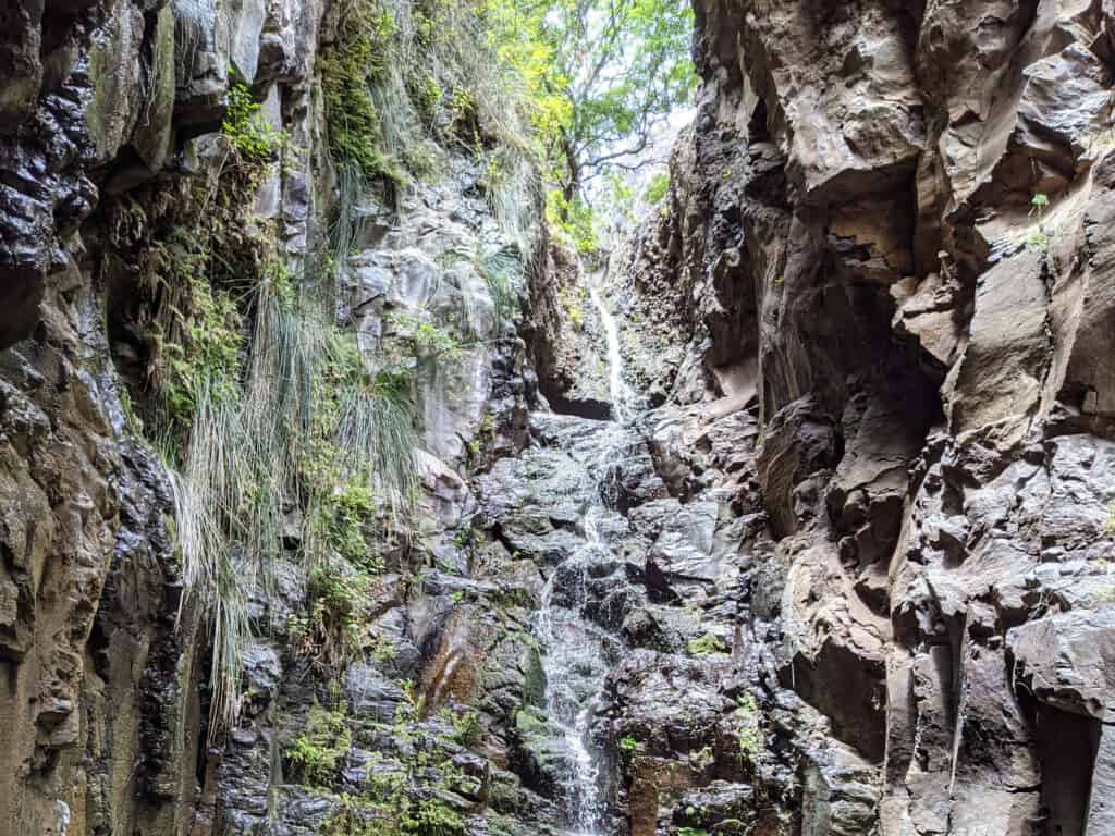Waterfall in a narrow rocky gorge